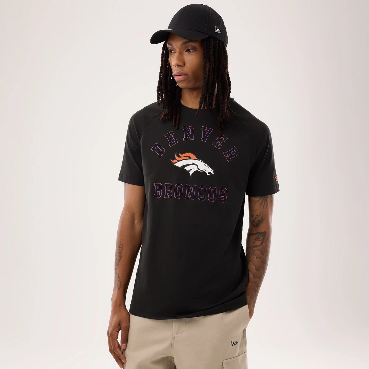 The model is wearing this NFL Sideline 2026 Denver Broncos T-Shirt in black. 1