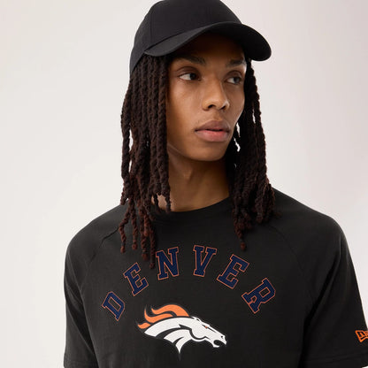 The model is wearing this NFL Sideline 2026 Denver Broncos T-Shirt in black. 7