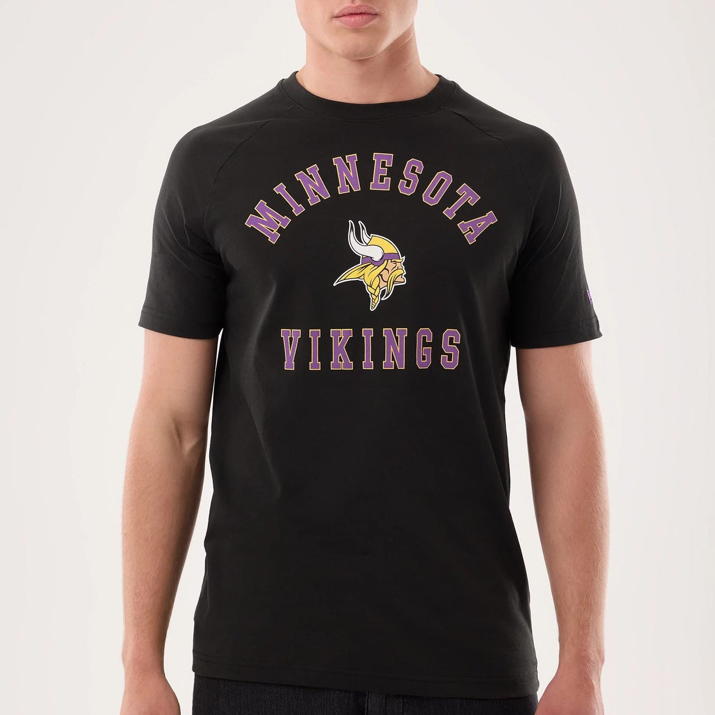 The model is wearing this NFL Sideline 2026 Minnesota Vikings T-Shirt in black. 4