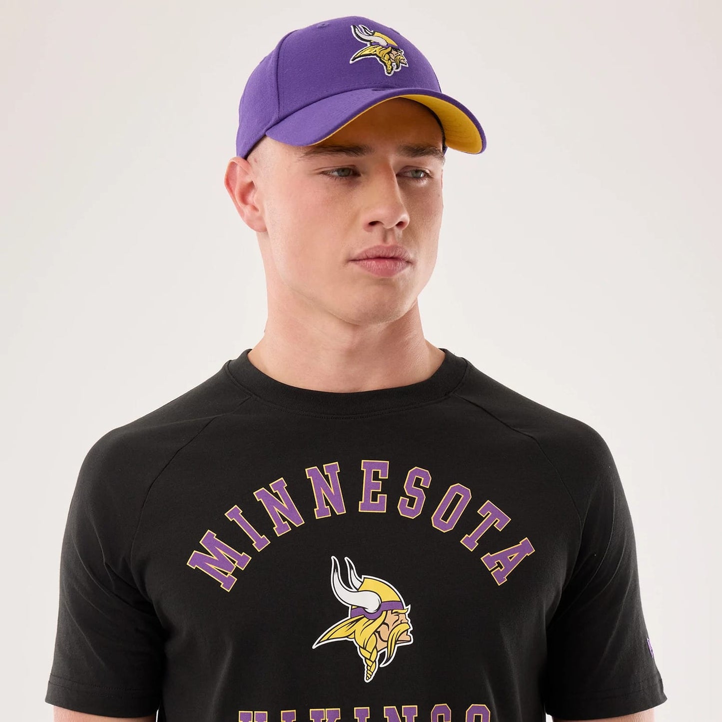The model is wearing this NFL Sideline 2026 Minnesota Vikings T-Shirt in black. 5