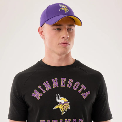 The model is wearing this NFL Sideline 2026 Minnesota Vikings T-Shirt in black. 5