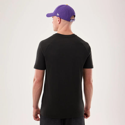 The model is wearing this NFL Sideline 2026 Minnesota Vikings T-Shirt in black. 2