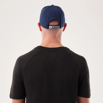 The model is wearing this NFL Sideline 2026 New England Patriots T-Shirt in black. 7