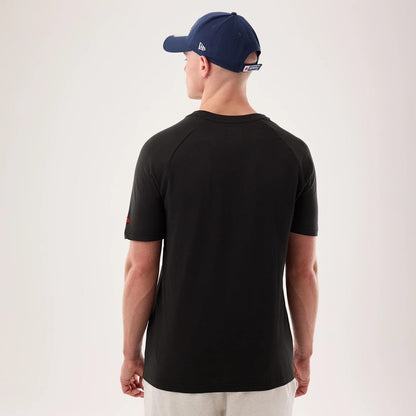 The model is wearing this NFL Sideline 2026 New England Patriots T-Shirt in black. 2