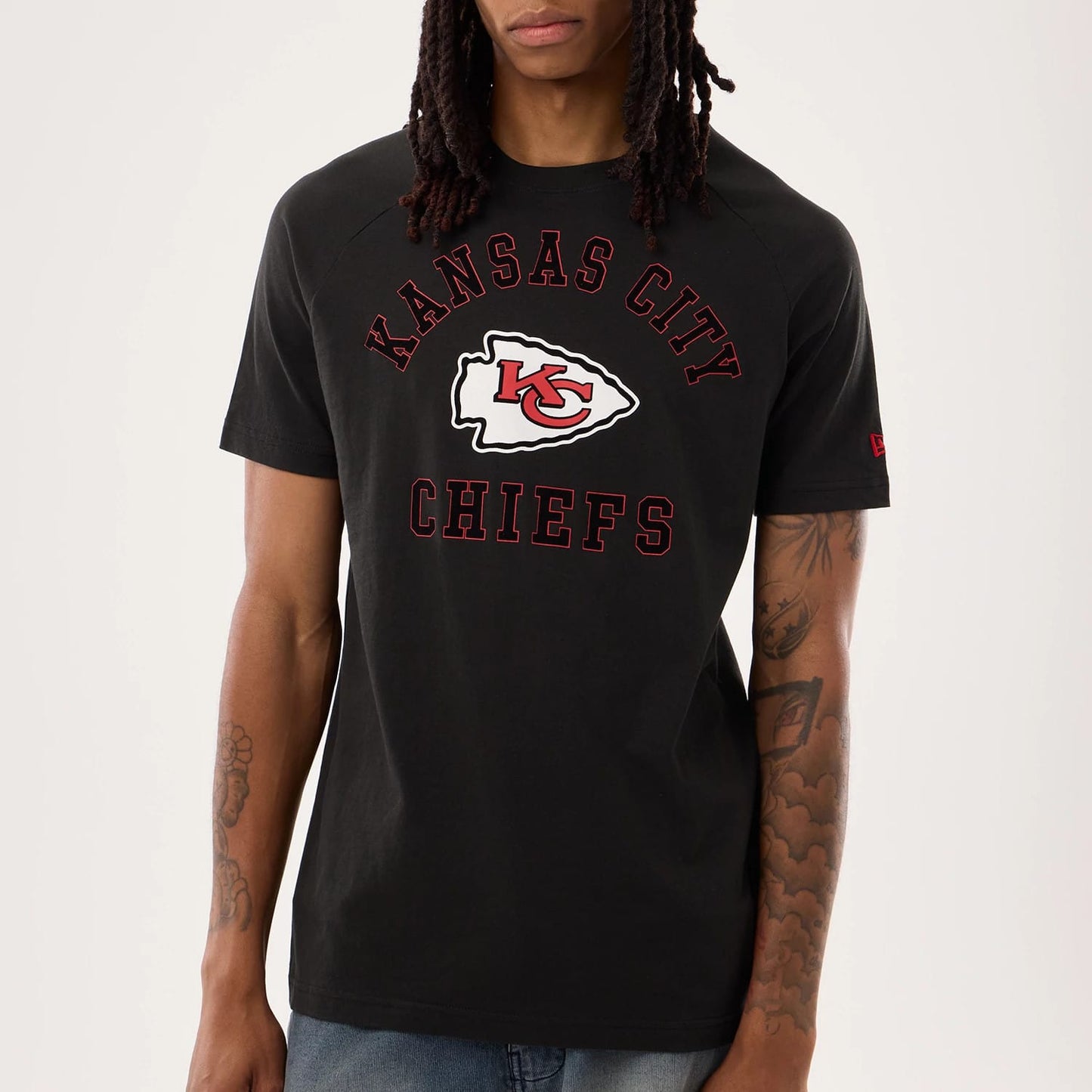 The model is wearing this NFL Sideline 2026 Kansas City Chiefs T-Shirt in black. 3