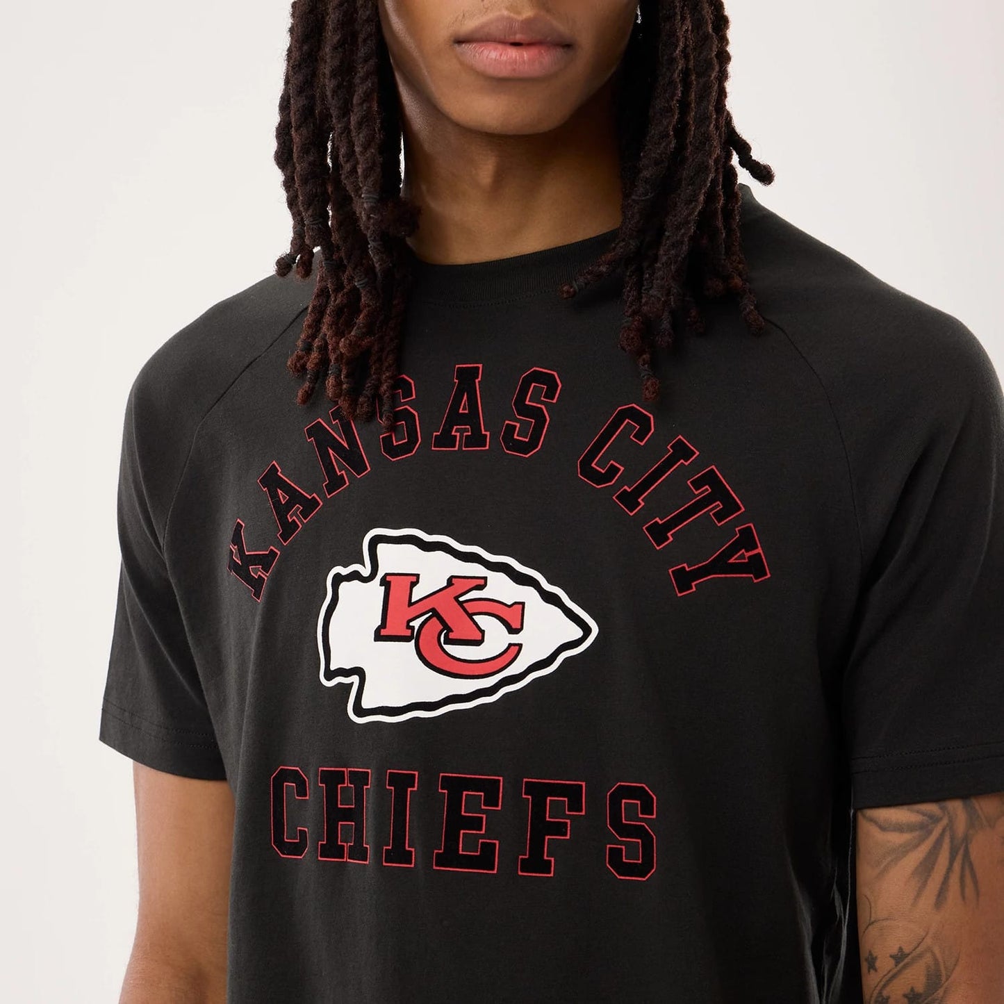 The model is wearing this NFL Sideline 2026 Kansas City Chiefs T-Shirt in black. 4