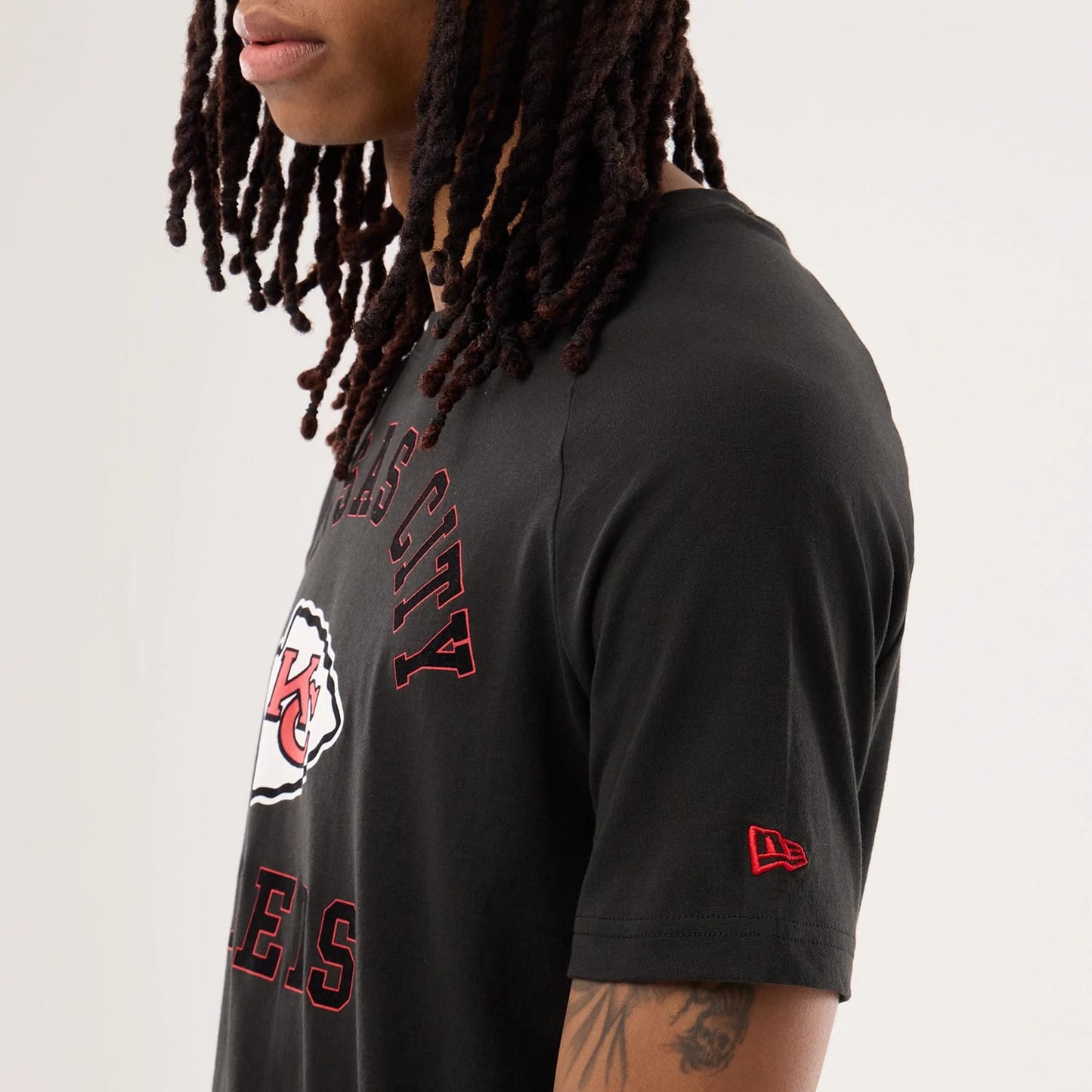 The model is wearing this NFL Sideline 2026 Kansas City Chiefs T-Shirt in black. 5