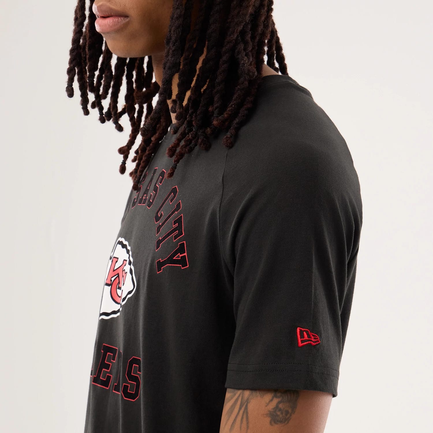The model is wearing this NFL Sideline 2026 Kansas City Chiefs T-Shirt in black. 5