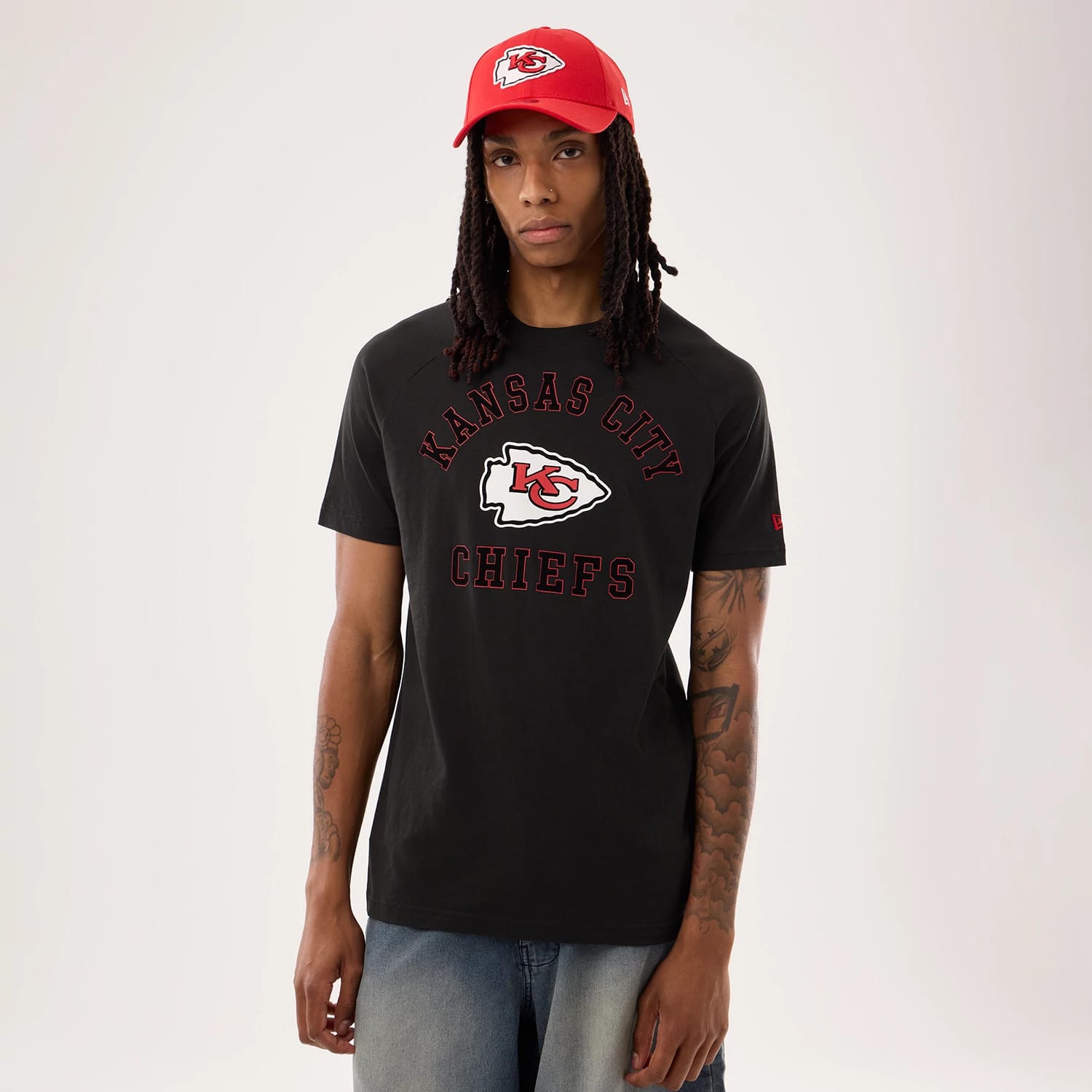 The model is wearing this NFL Sideline 2026 Kansas City Chiefs T-Shirt in black. 1