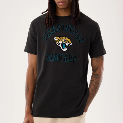 The model is wearing this NFL Sideline 2026 Jacksonville Jaguars T-Shirt in black. 4
