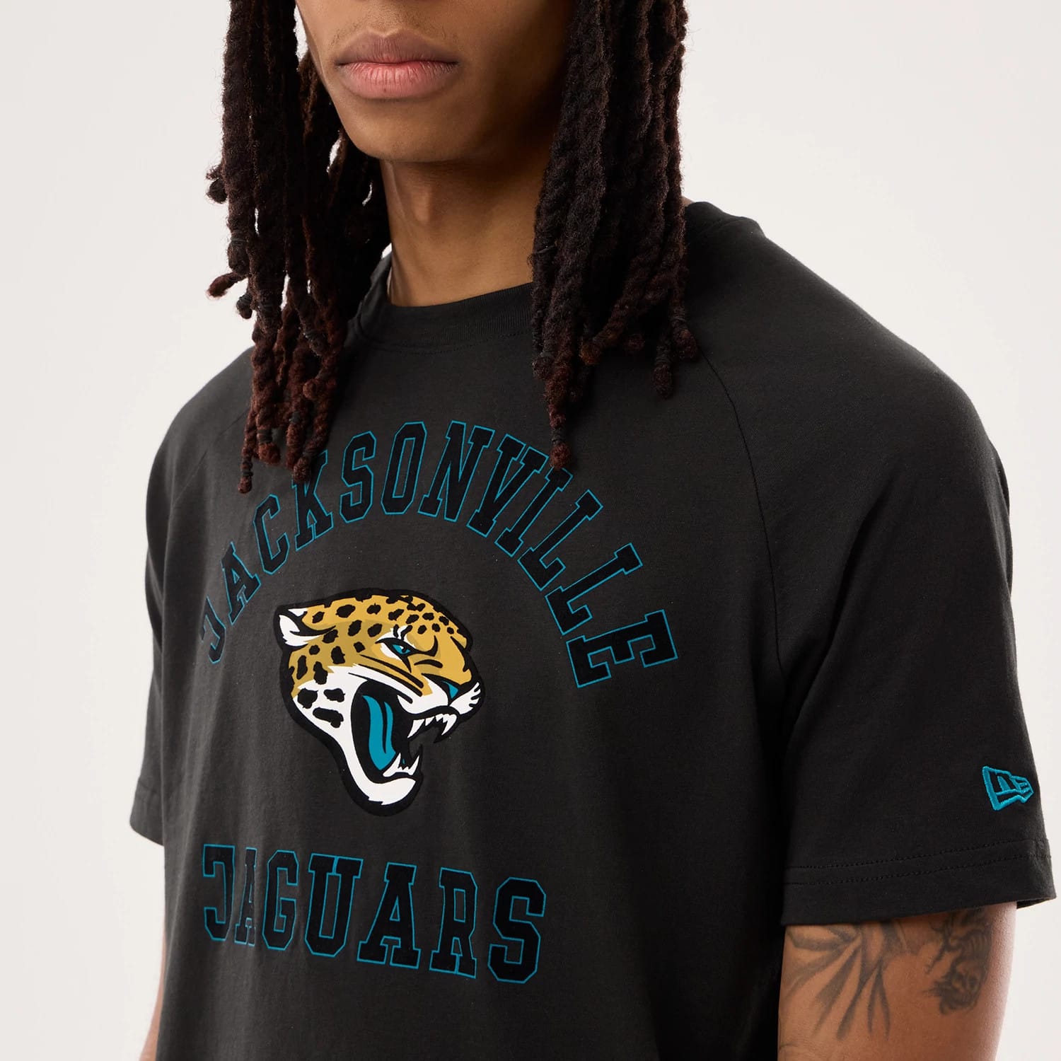 The model is wearing this NFL Sideline 2026 Jacksonville Jaguars T-Shirt in black. 3