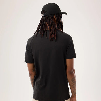 The model is wearing this NFL Sideline 2026 Jacksonville Jaguars T-Shirt in black. 2
