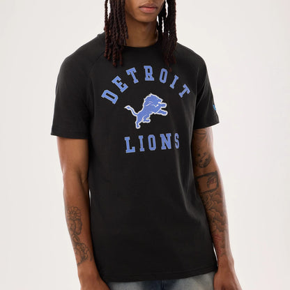 The model is wearing this NFL Sideline 2026 Detroit Lions T-Shirt in black. 3