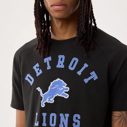 The model is wearing this NFL Sideline 2026 Detroit Lions T-Shirt in black. 4