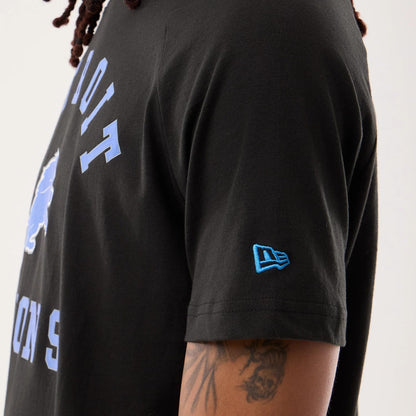 The model is wearing this NFL Sideline 2026 Detroit Lions T-Shirt in black. 5