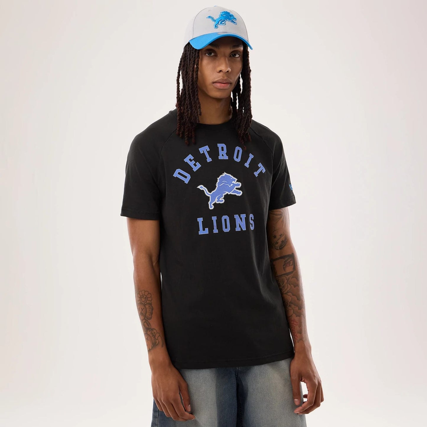 The model is wearing this NFL Sideline 2026 Detroit Lions T-Shirt in black. 1