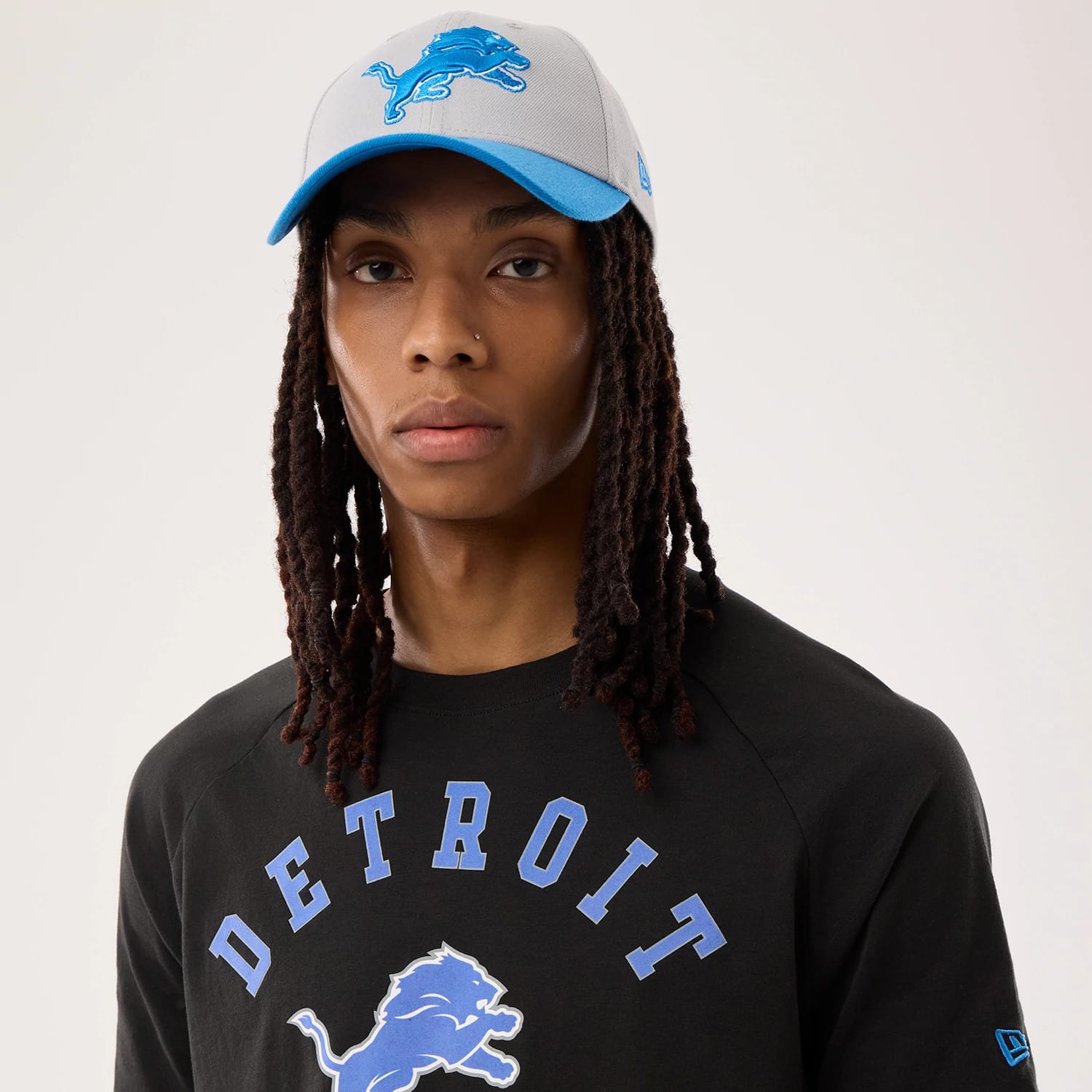The model is wearing this NFL Sideline 2026 Detroit Lions T-Shirt in black. 6