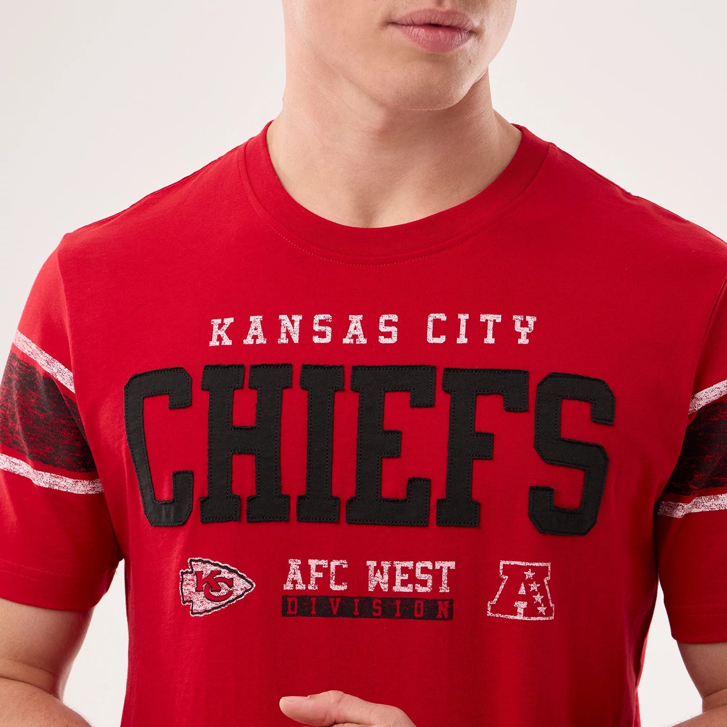 The model is wearing this NFL Sideline 2026 Kansas City Chiefs T-Shirt in red. 3