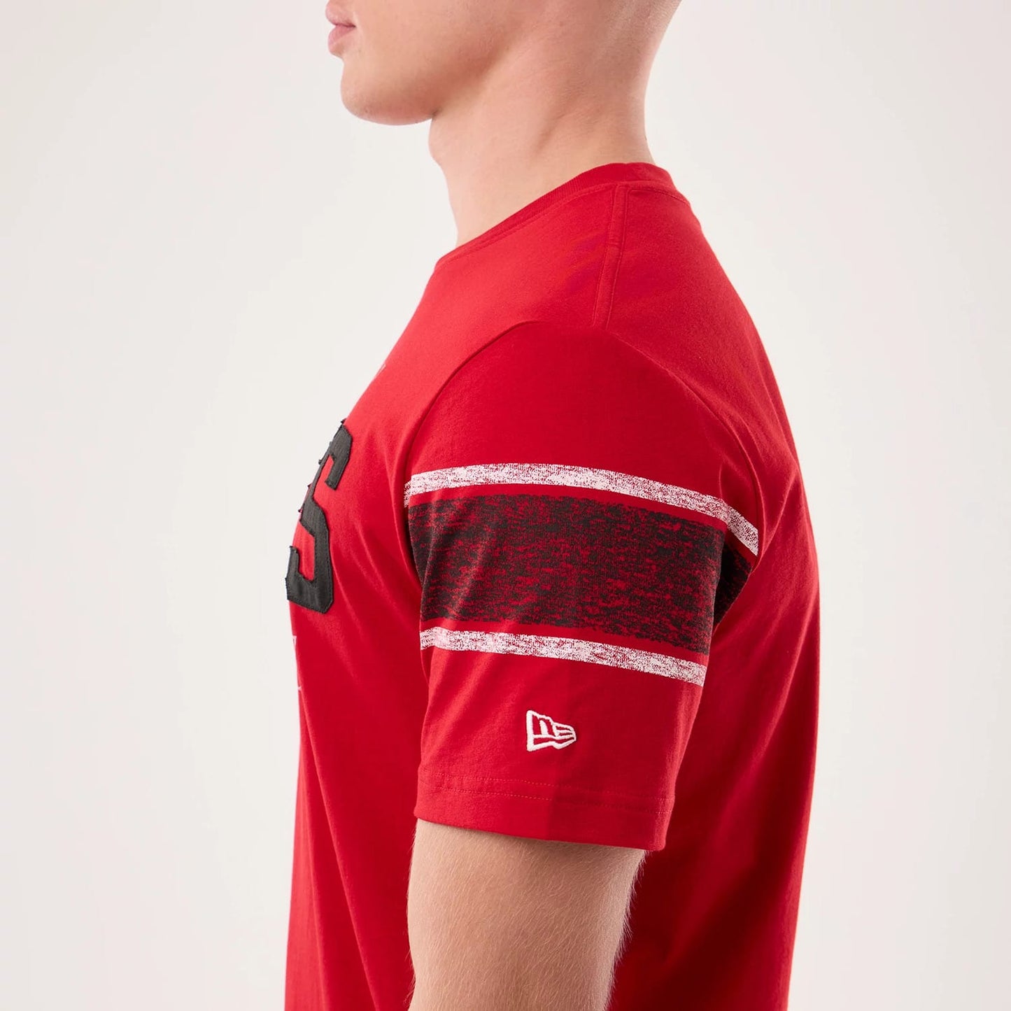 The model is wearing this NFL Sideline 2026 Kansas City Chiefs T-Shirt in red. 7