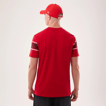 The model is wearing this NFL Sideline 2026 Kansas City Chiefs T-Shirt in red. 2