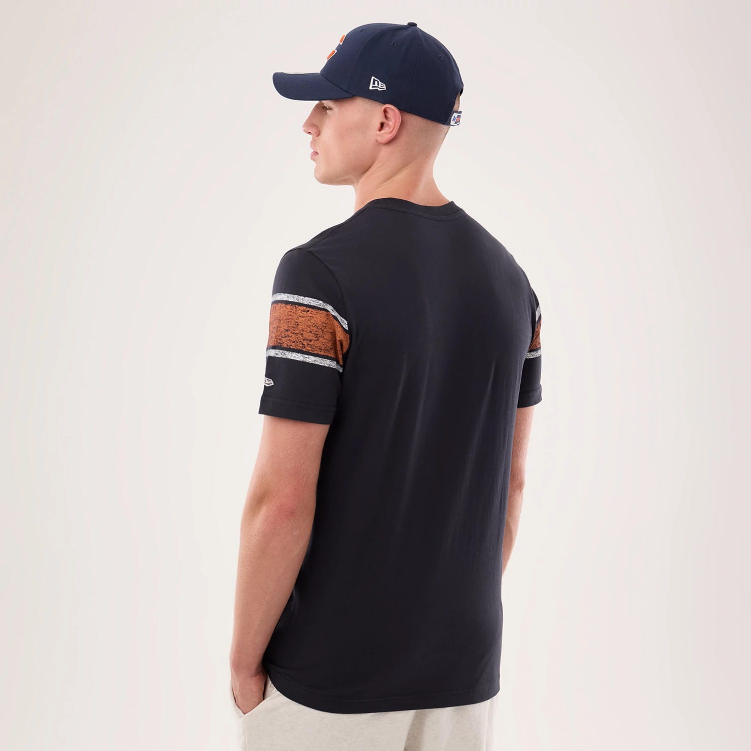 The model is wearing this NFL Sideline 2026 Chicago Bears T-Shirt in navy. 2