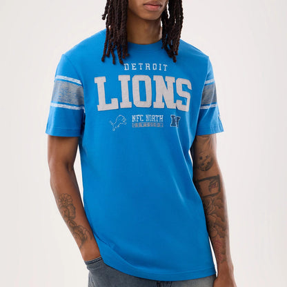 The model is wearing this NFL Sideline 2026 Detroit Lions T-Shirt in blue. 7