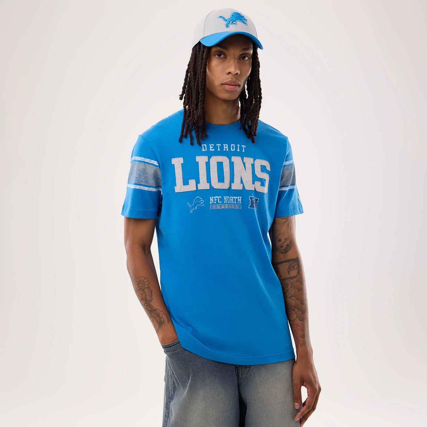 The model is wearing this NFL Sideline 2026 Detroit Lions T-Shirt in blue. 1