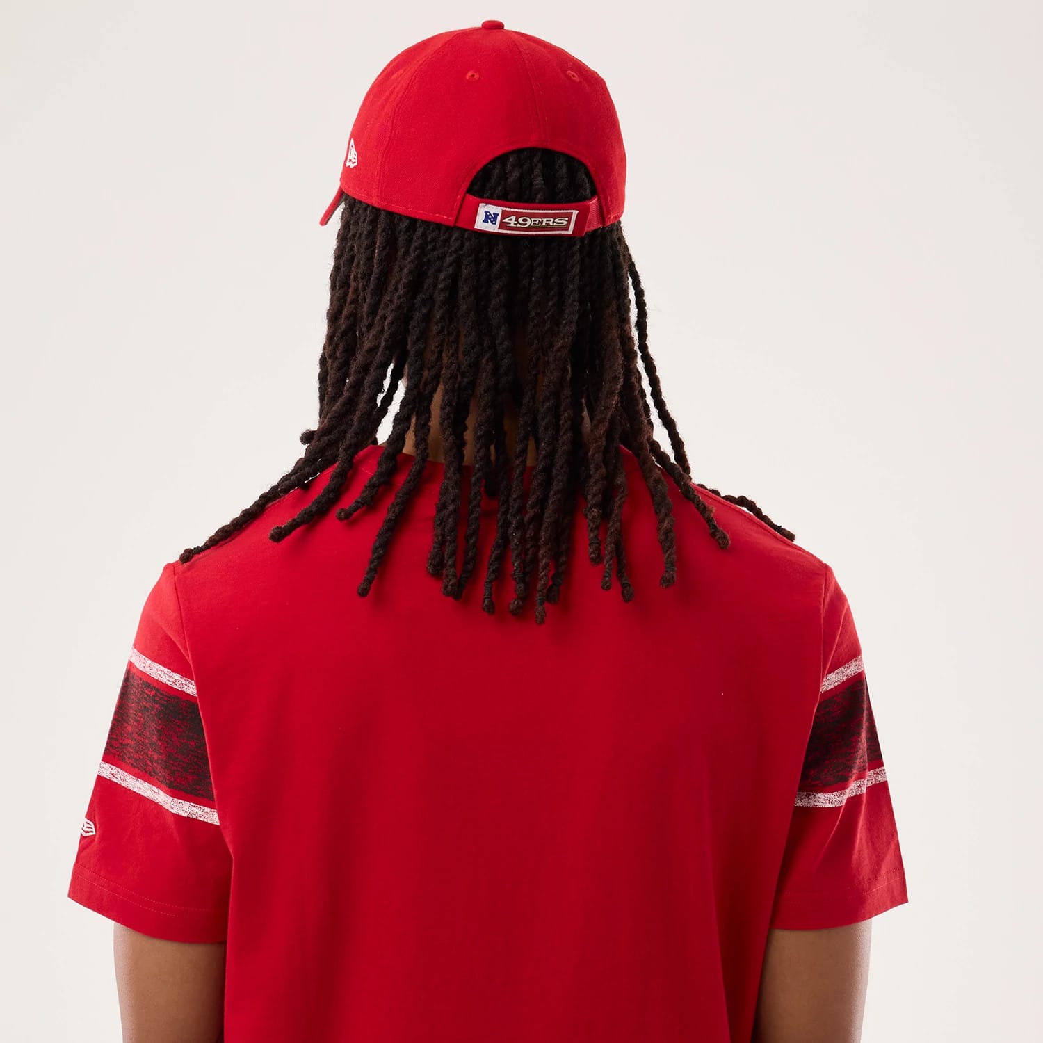 The model is wearing this NFL Sideline 2026 San Francisco 49ers T-Shirt in red. 7