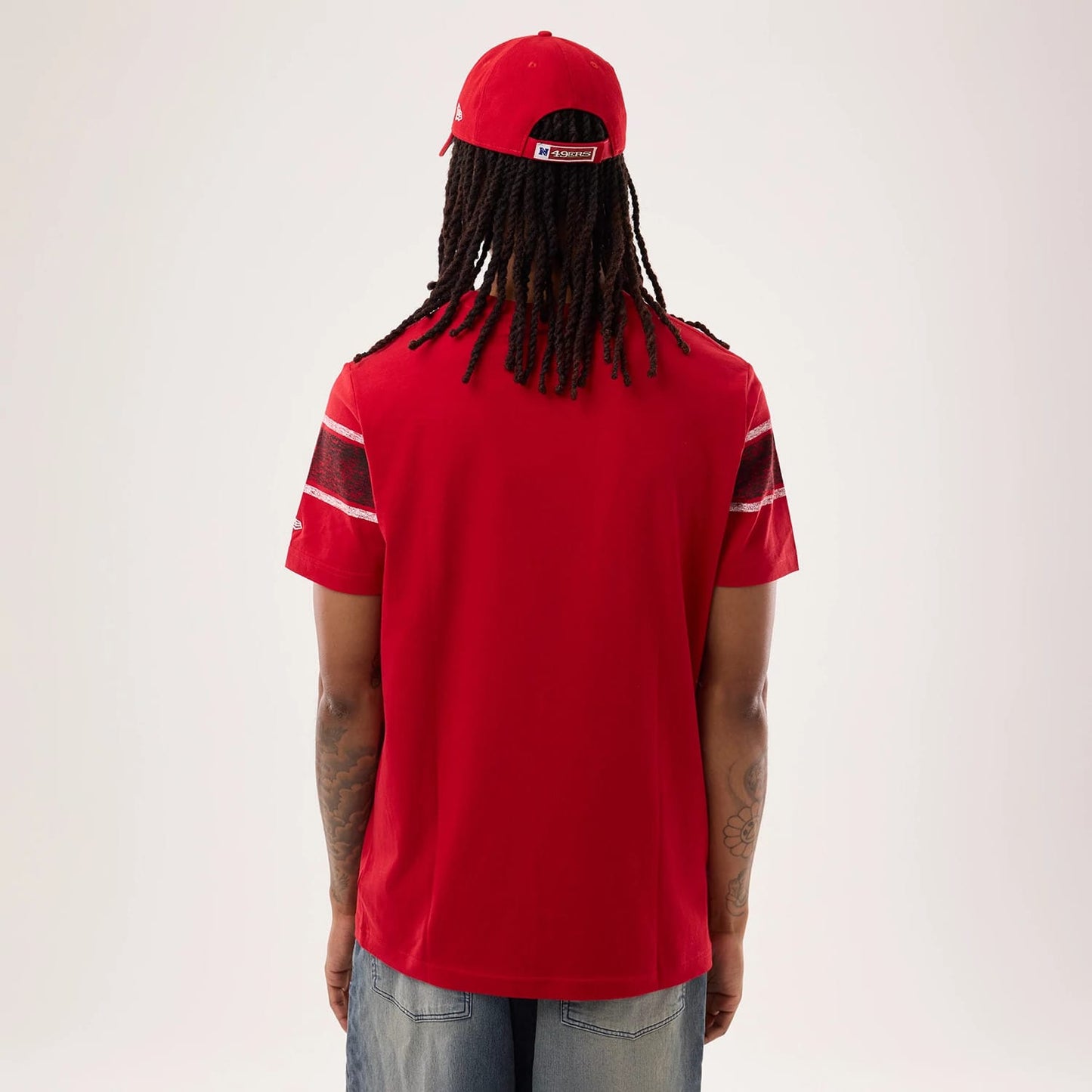 The model is wearing this NFL Sideline 2026 San Francisco 49ers T-Shirt in red. 2