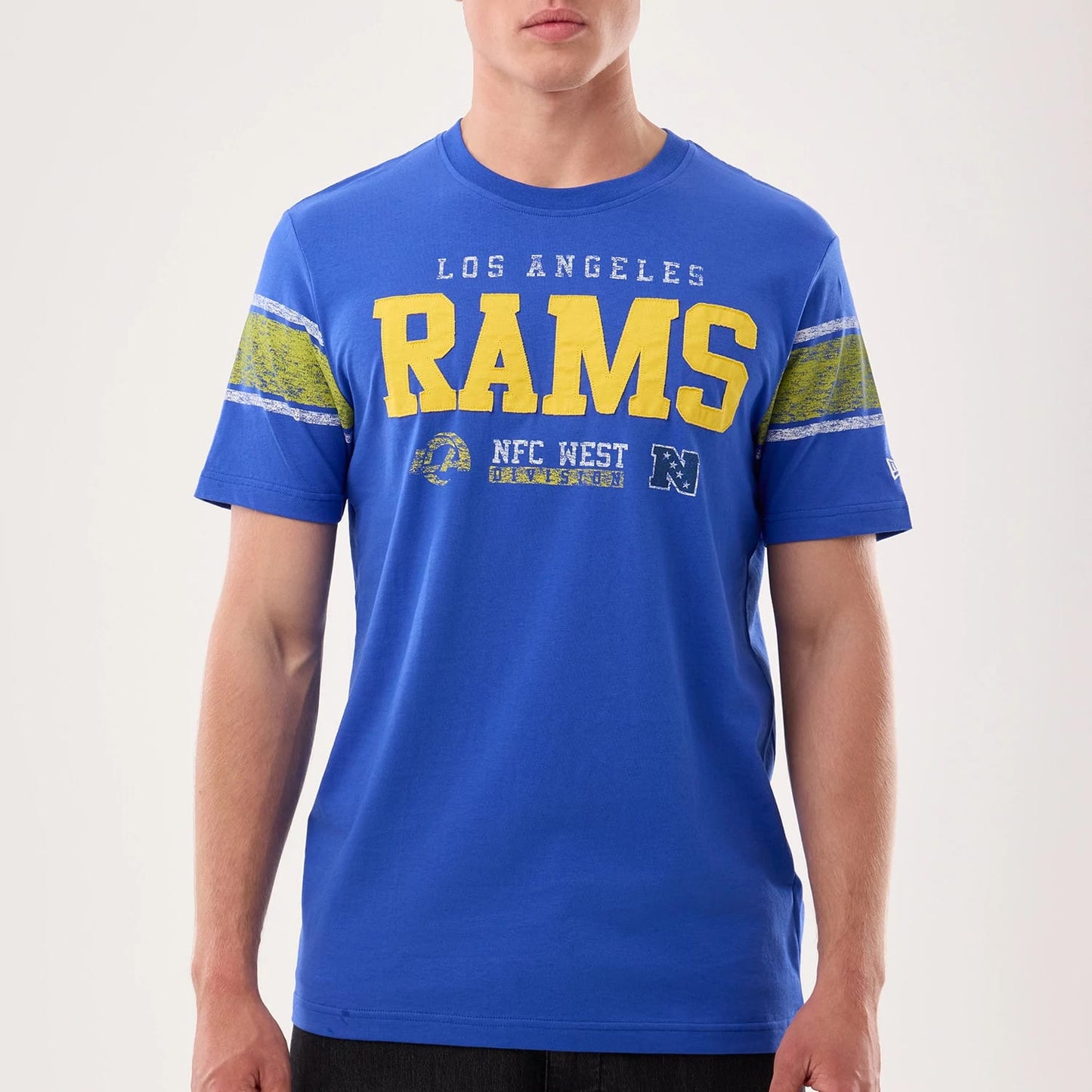 The model is wearing this NFL Sideline 2026 LA Rams T-Shirt in bright blue. 7