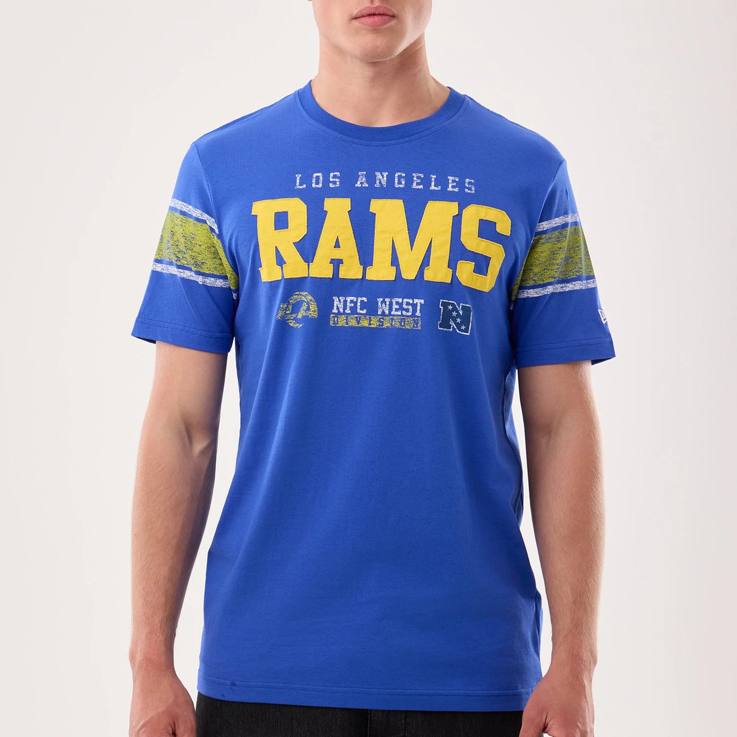 The model is wearing this NFL Sideline 2026 LA Rams T-Shirt in bright blue. 7