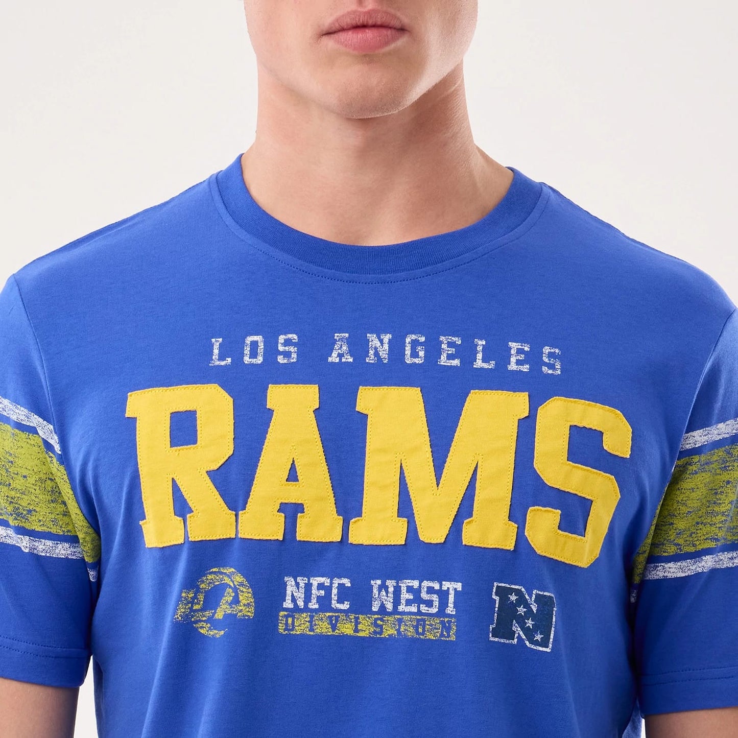 The model is wearing this NFL Sideline 2026 LA Rams T-Shirt in bright blue. 3