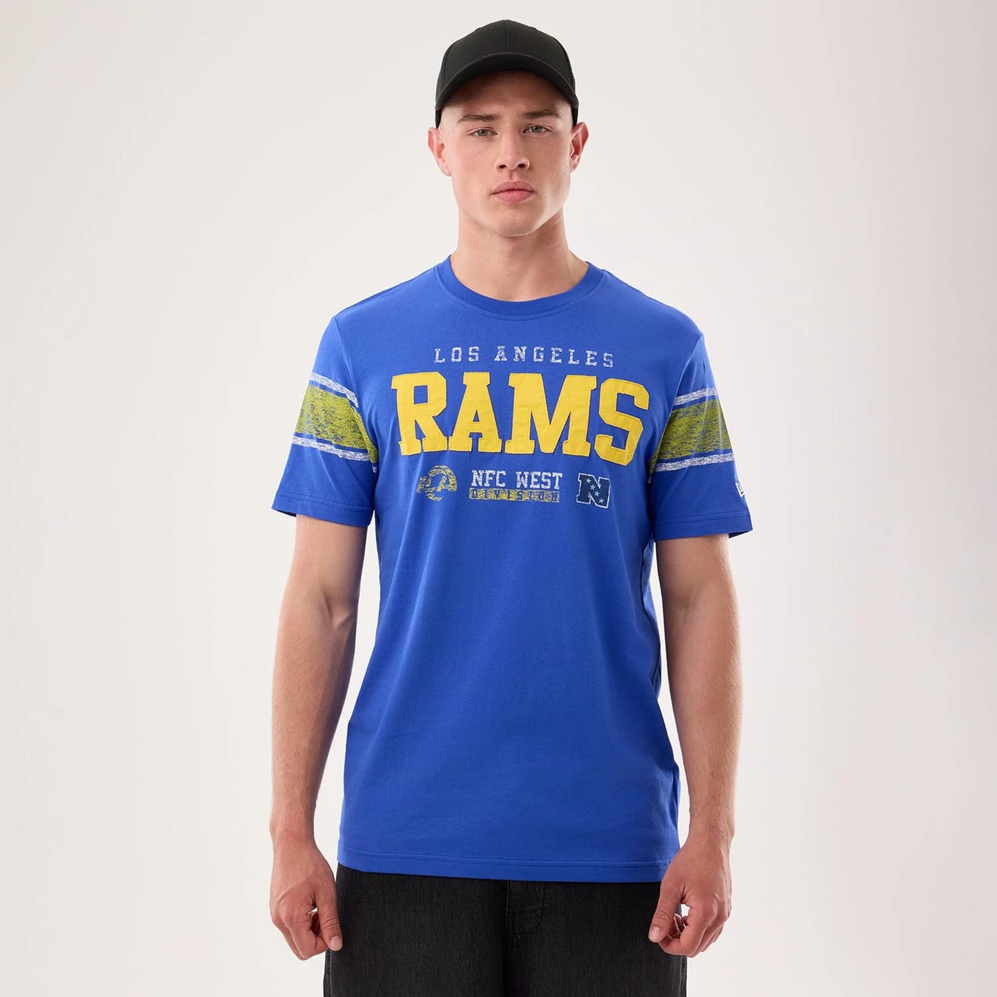 The model is wearing this NFL Sideline 2026 LA Rams T-Shirt in bright blue. 1