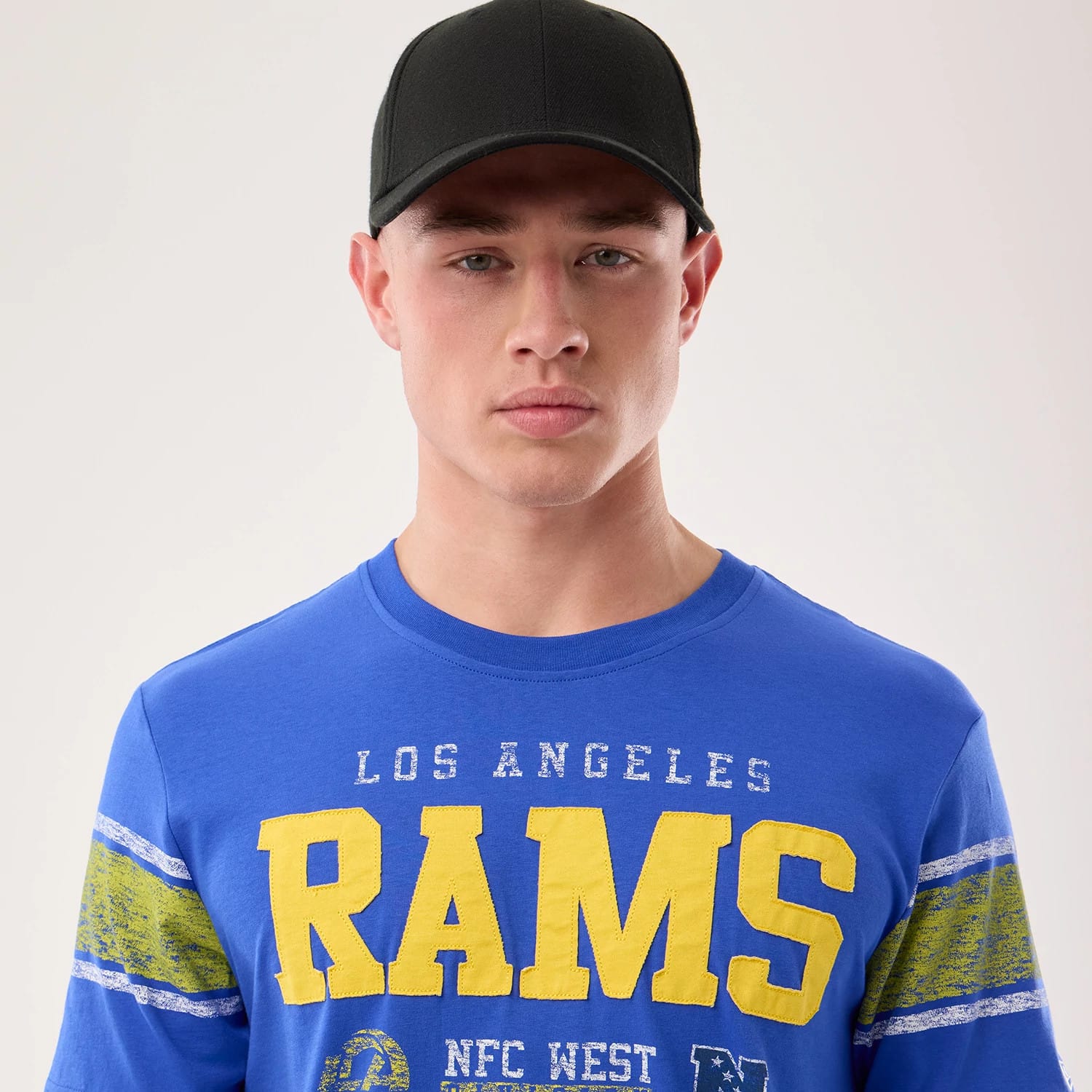 The model is wearing this NFL Sideline 2026 LA Rams T-Shirt in bright blue. 5
