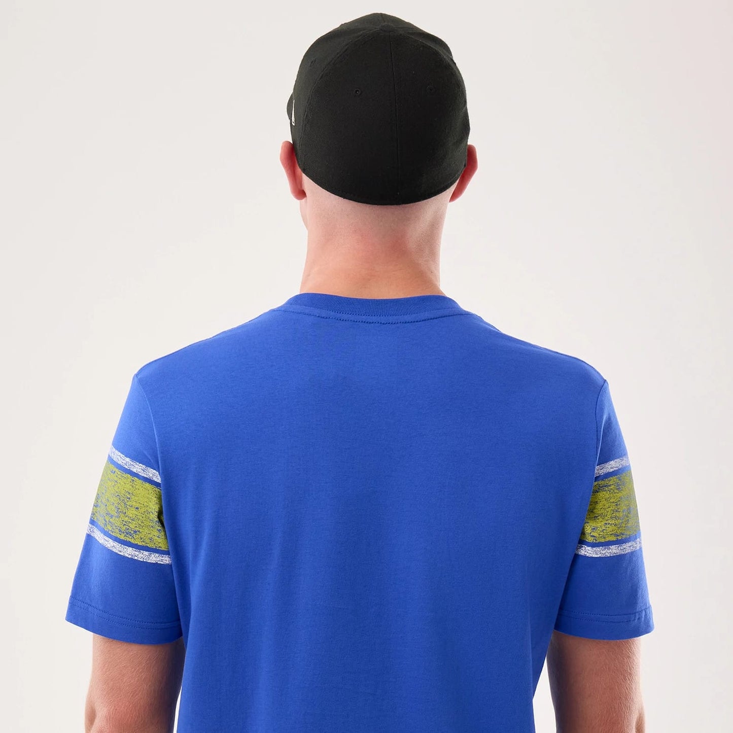 The model is wearing this NFL Sideline 2026 LA Rams T-Shirt in bright blue. 6