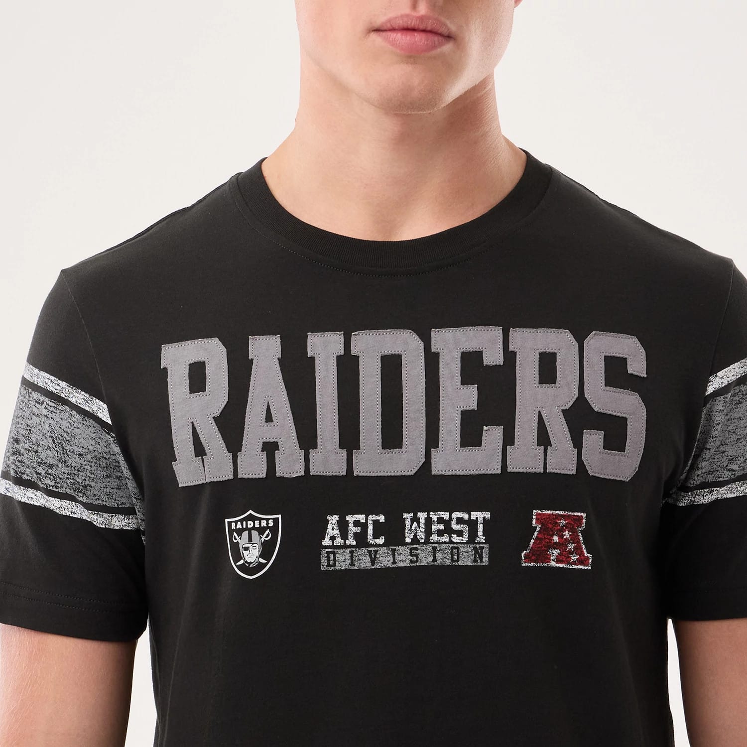 The model is wearing this NFL Sideline 2026 Las Vegas Raiders T-Shirt in black. 3