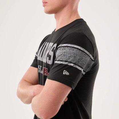 The model is wearing this NFL Sideline 2026 Las Vegas Raiders T-Shirt in black. 7