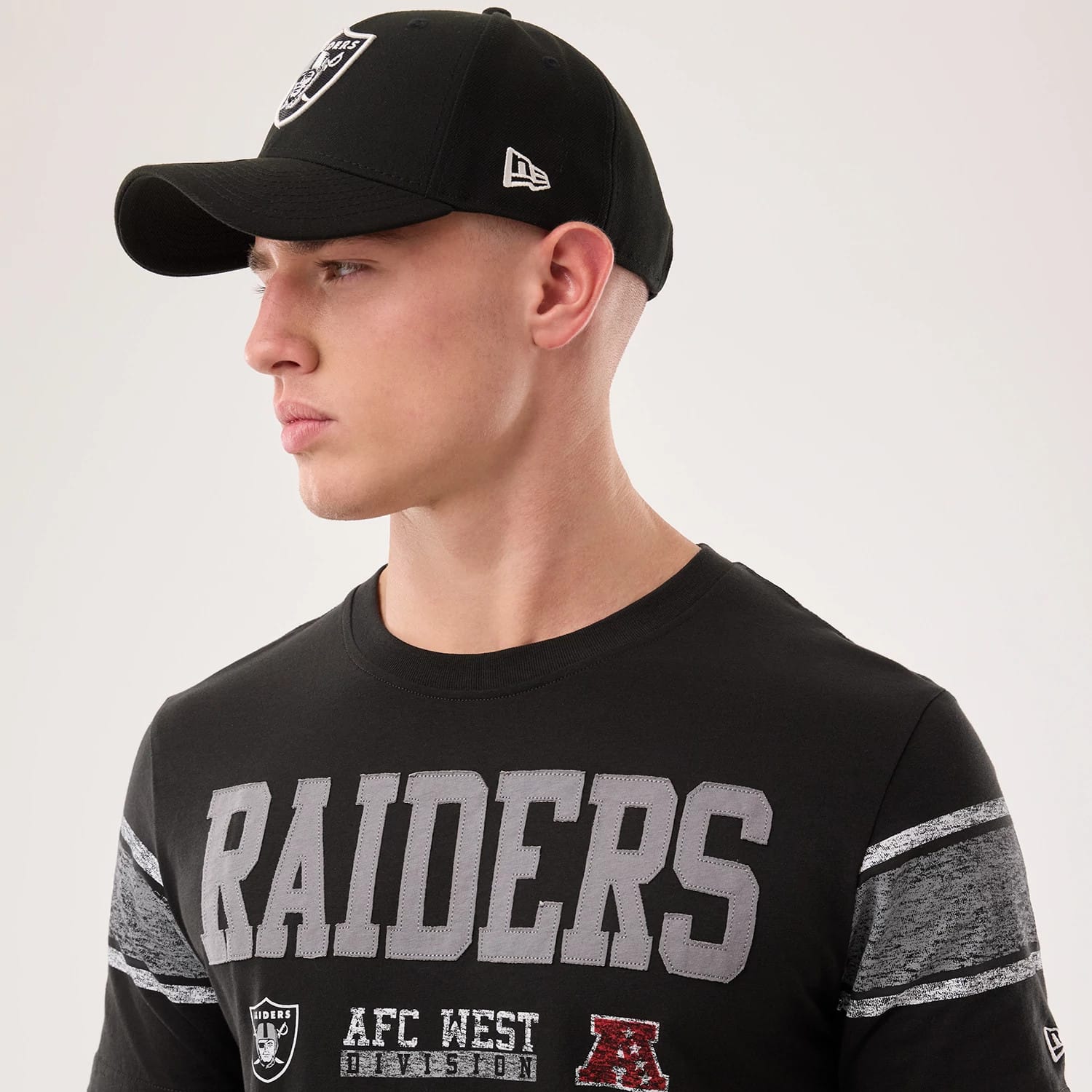 The model is wearing this NFL Sideline 2026 Las Vegas Raiders T-Shirt in black. 4