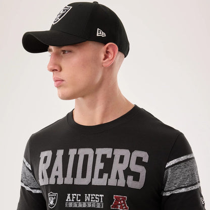 The model is wearing this NFL Sideline 2026 Las Vegas Raiders T-Shirt in black. 4