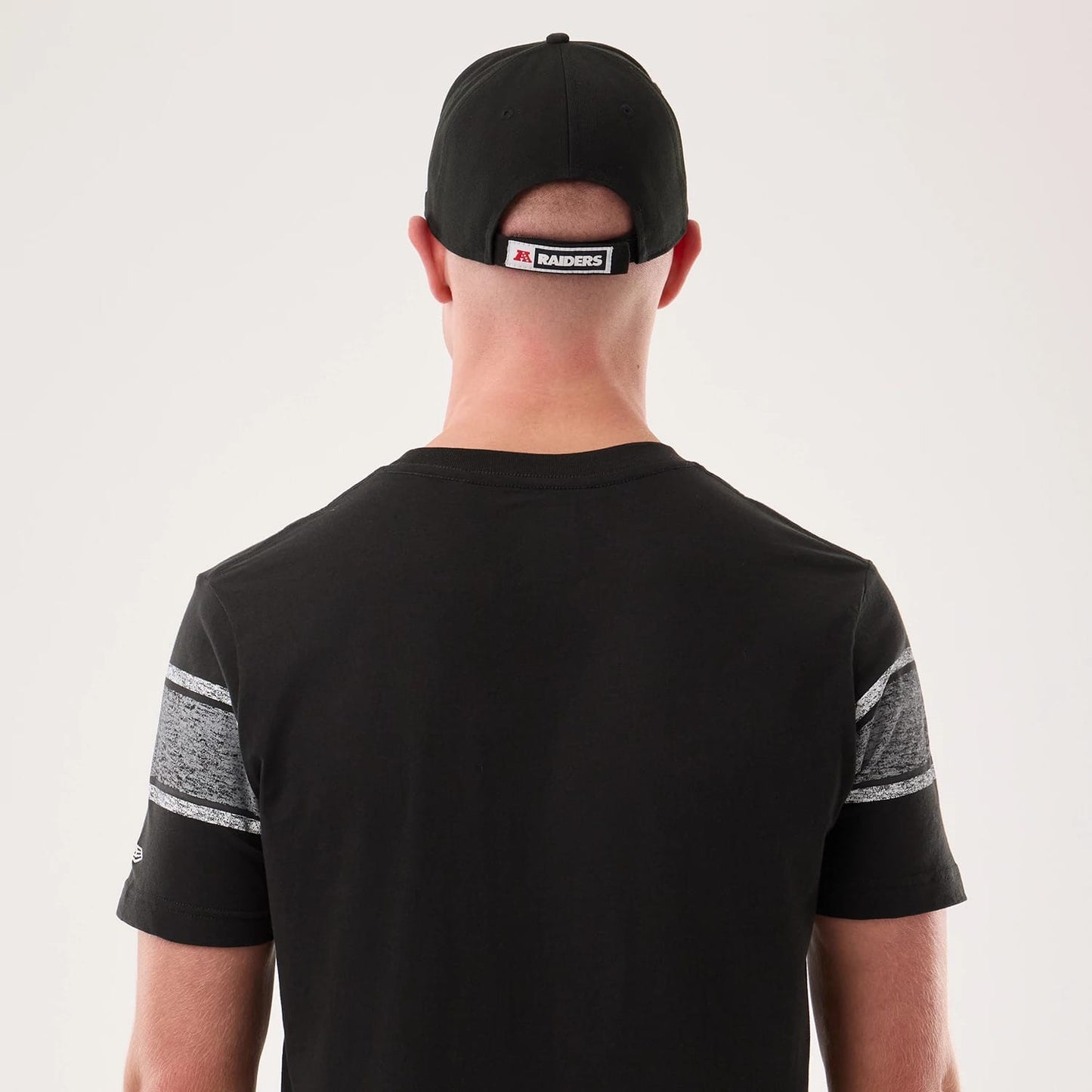The model is wearing this NFL Sideline 2026 Las Vegas Raiders T-Shirt in black. 5