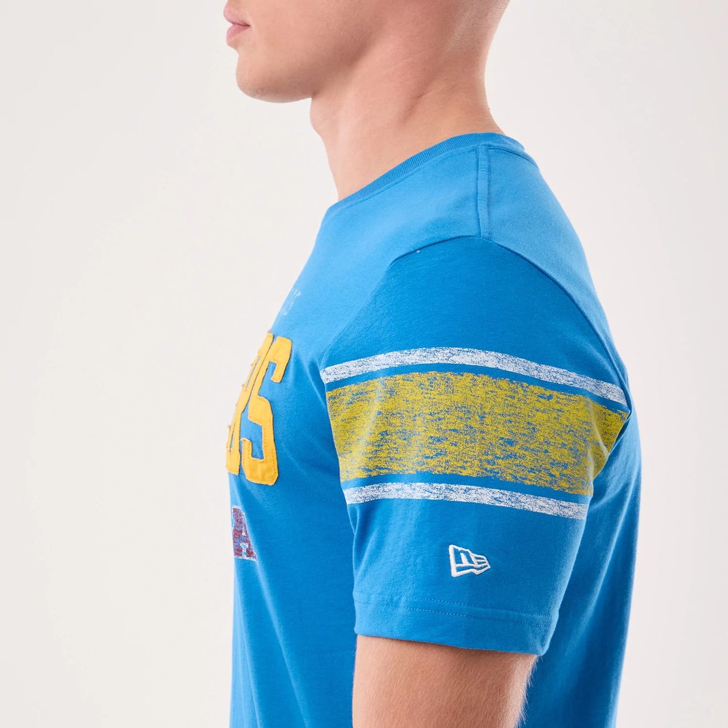 The model is wearing this NFL Sideline 2026 LA Chargers T-Shirt in blue. 5