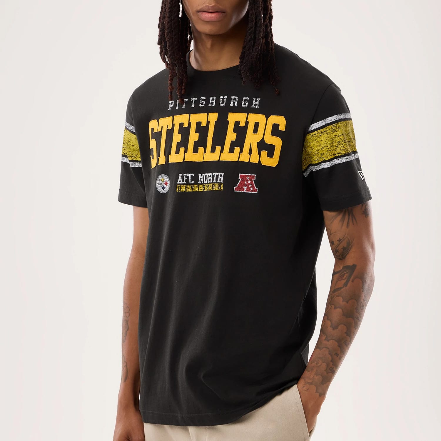 The model is wearing this NFL Sideline 2026 Pittsburgh Steelers T-Shirt in black. 3