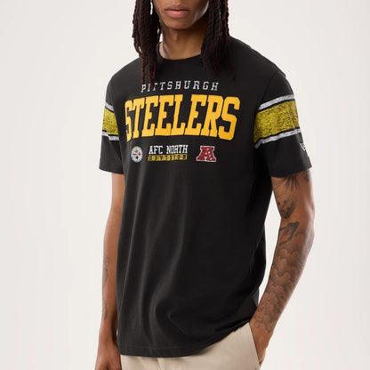 The model is wearing this NFL Sideline 2026 Pittsburgh Steelers T-Shirt in black. 3