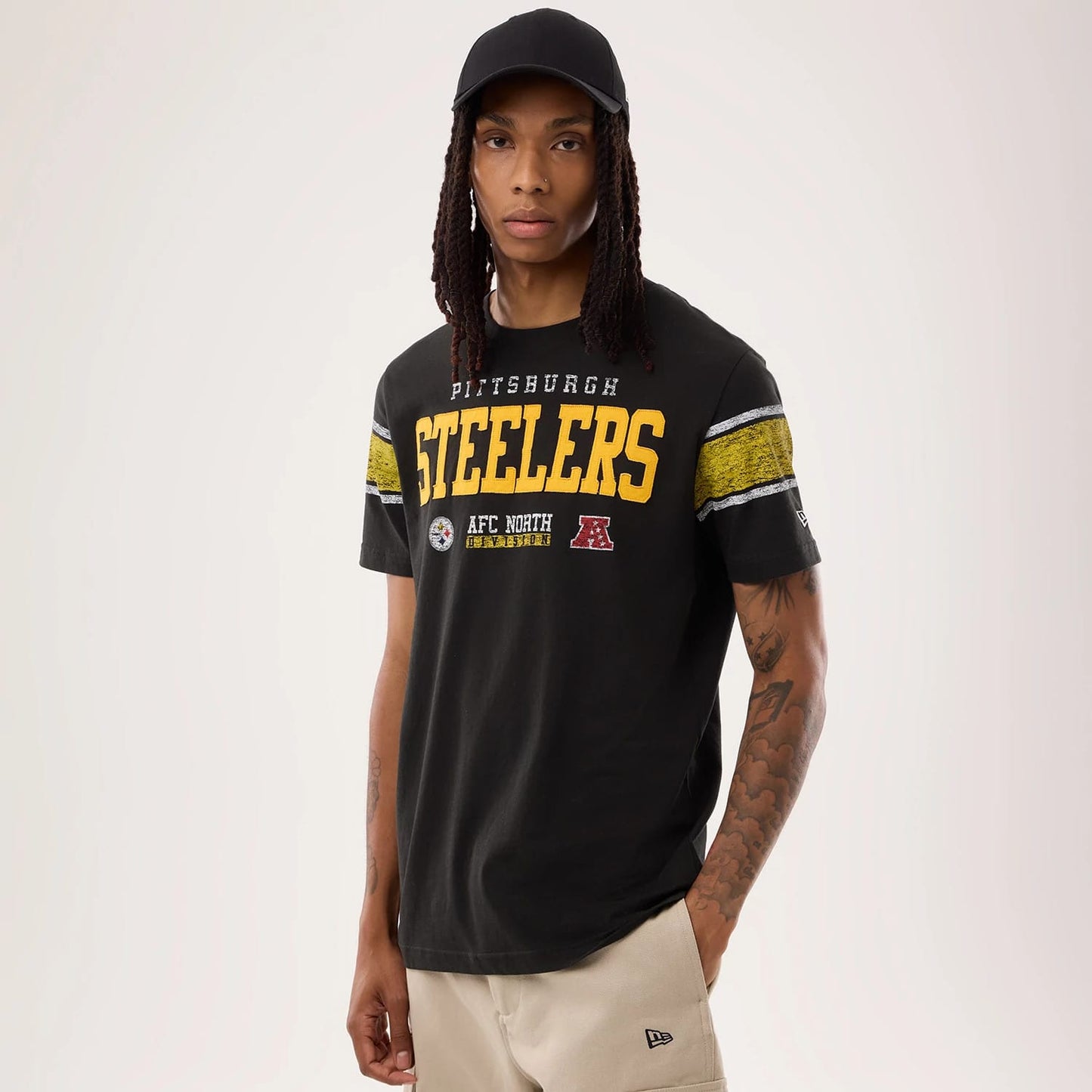 The model is wearing this NFL Sideline 2026 Pittsburgh Steelers T-Shirt in black. 1