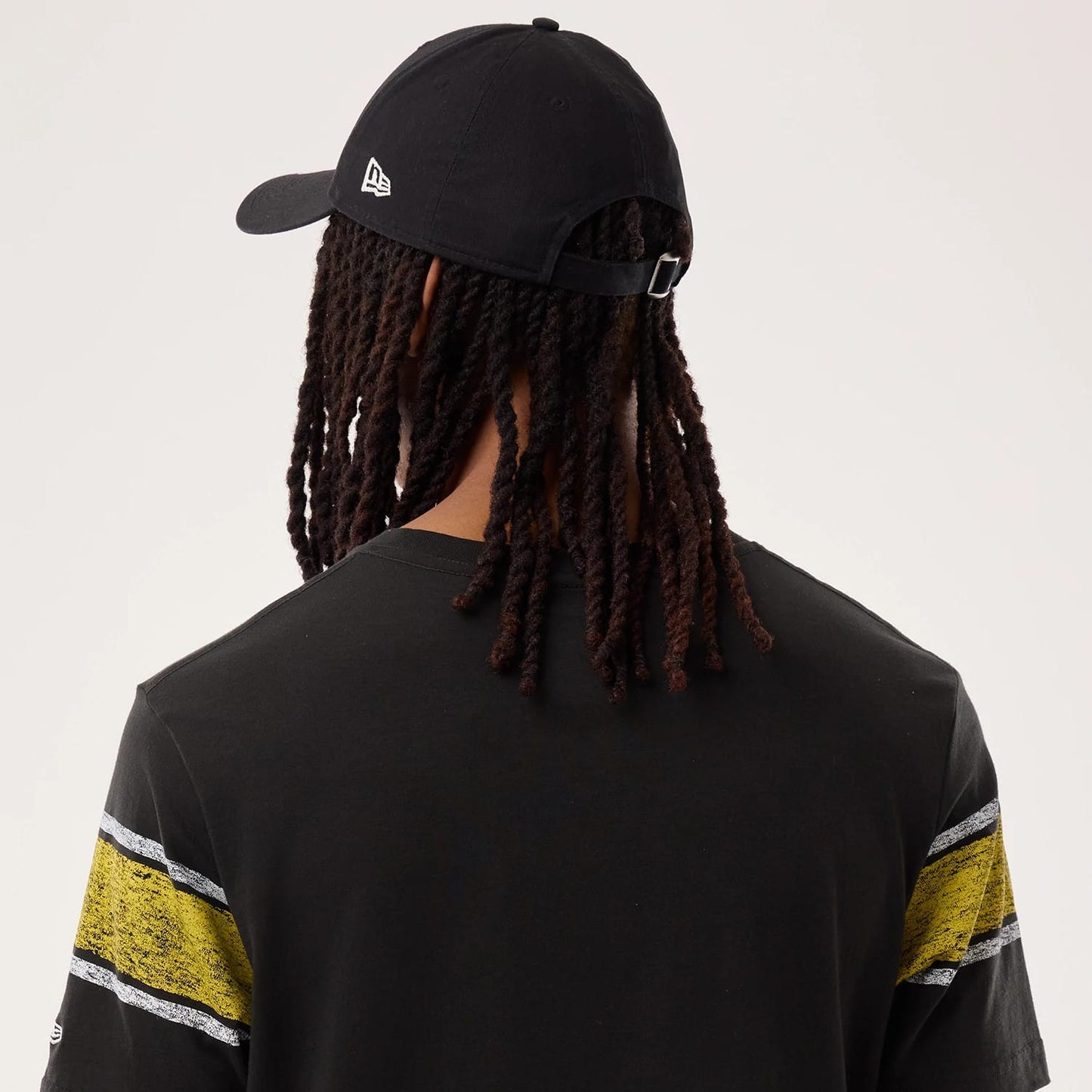 The model is wearing this NFL Sideline 2026 Pittsburgh Steelers T-Shirt in black. 6