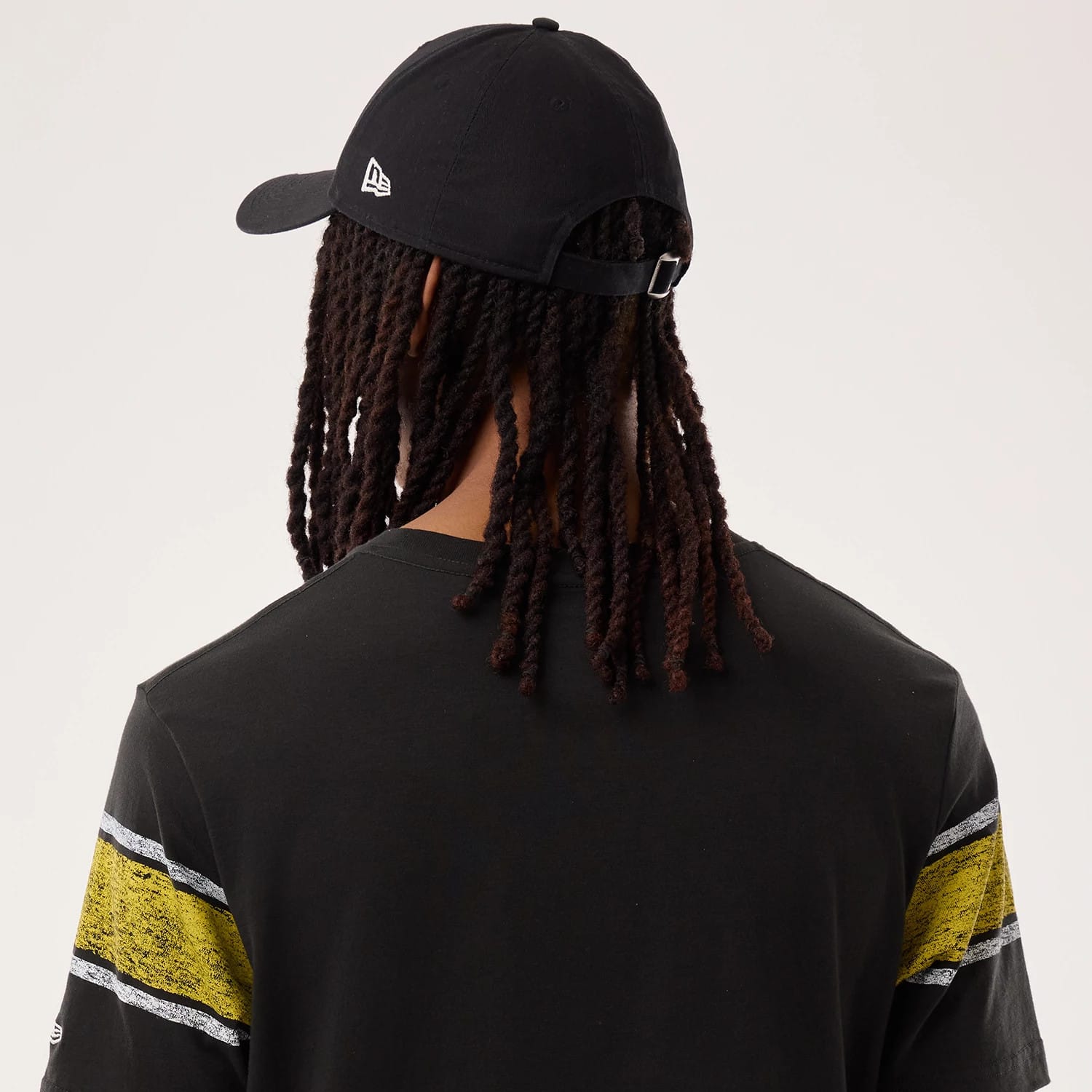 The model is wearing this NFL Sideline 2026 Pittsburgh Steelers T-Shirt in black. 6