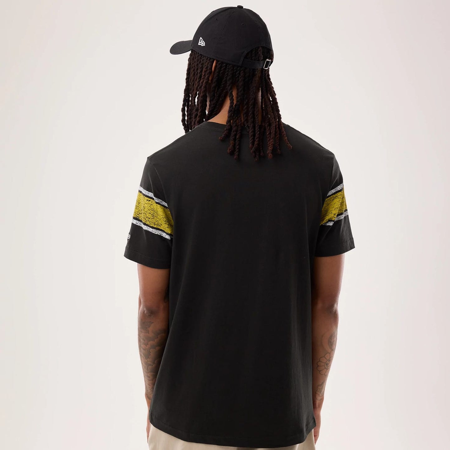 The model is wearing this NFL Sideline 2026 Pittsburgh Steelers T-Shirt in black. 2