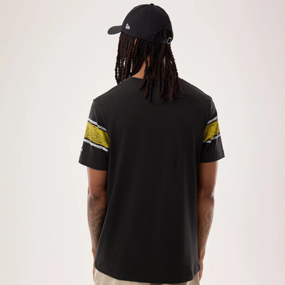 The model is wearing this NFL Sideline 2026 Pittsburgh Steelers T-Shirt in black. 2