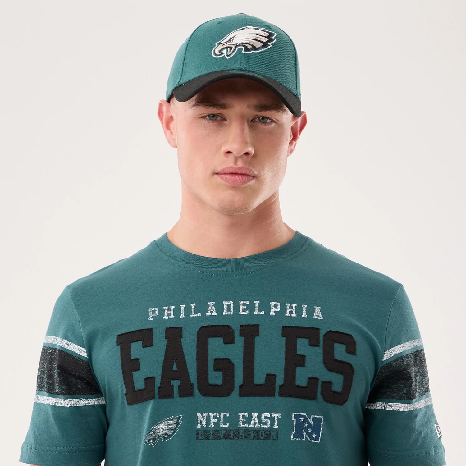The model is wearing this NFL Sideline 2026 Philadelphia Eagles T-Shirt in dark green. 6