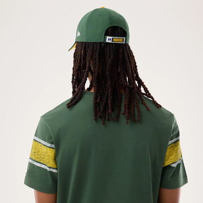 The model is wearing this NFL Sideline 2026 Green Bay Packers T-Shirt in dark green. 7